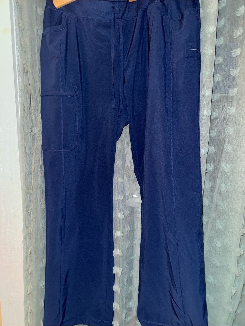 Woman’s navy blue scrub pants